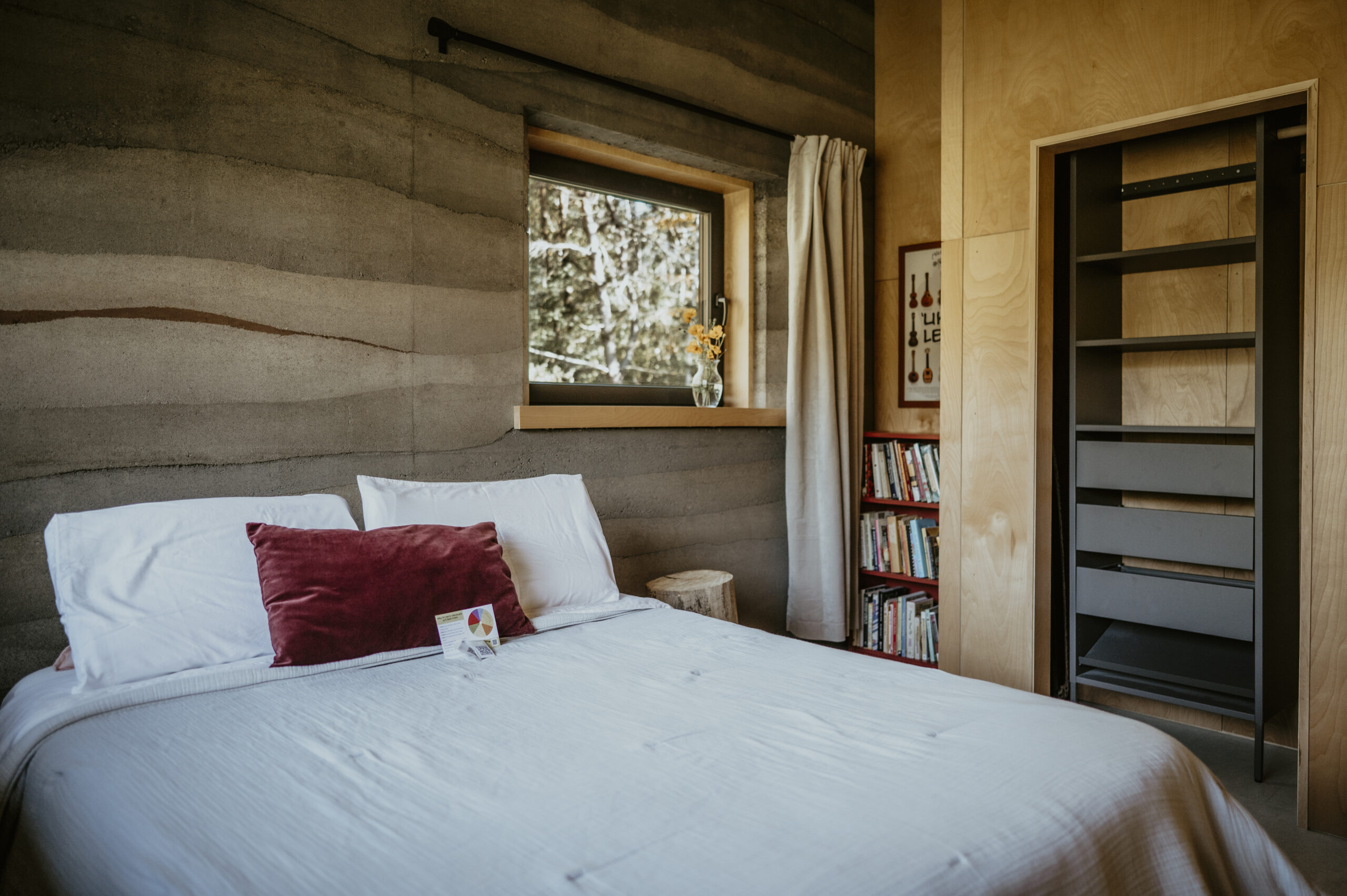 Bedroom with storage and books